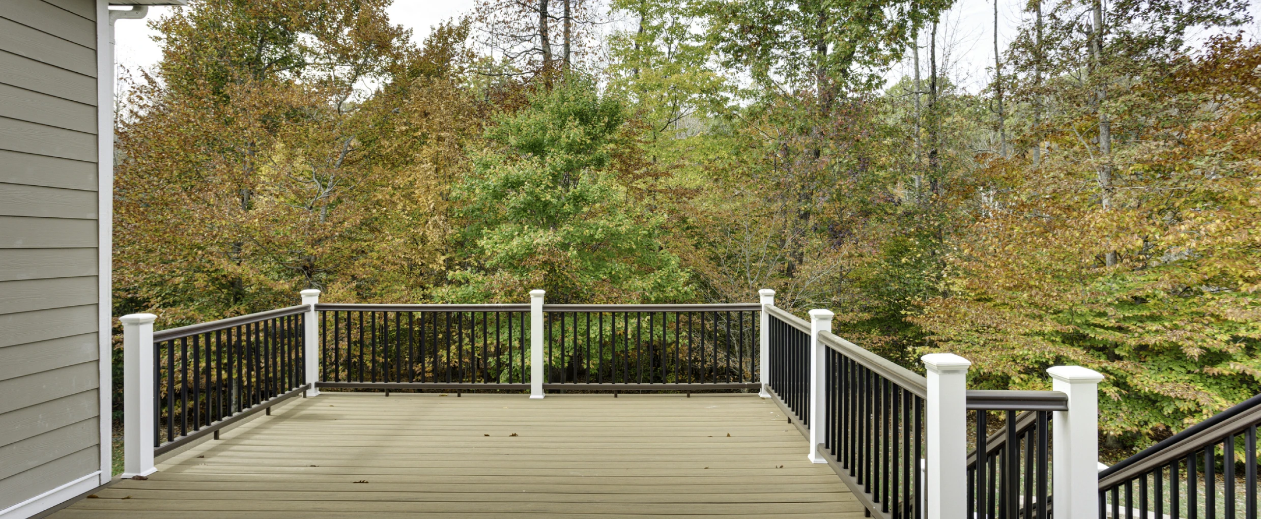 Spacious deck with forest view